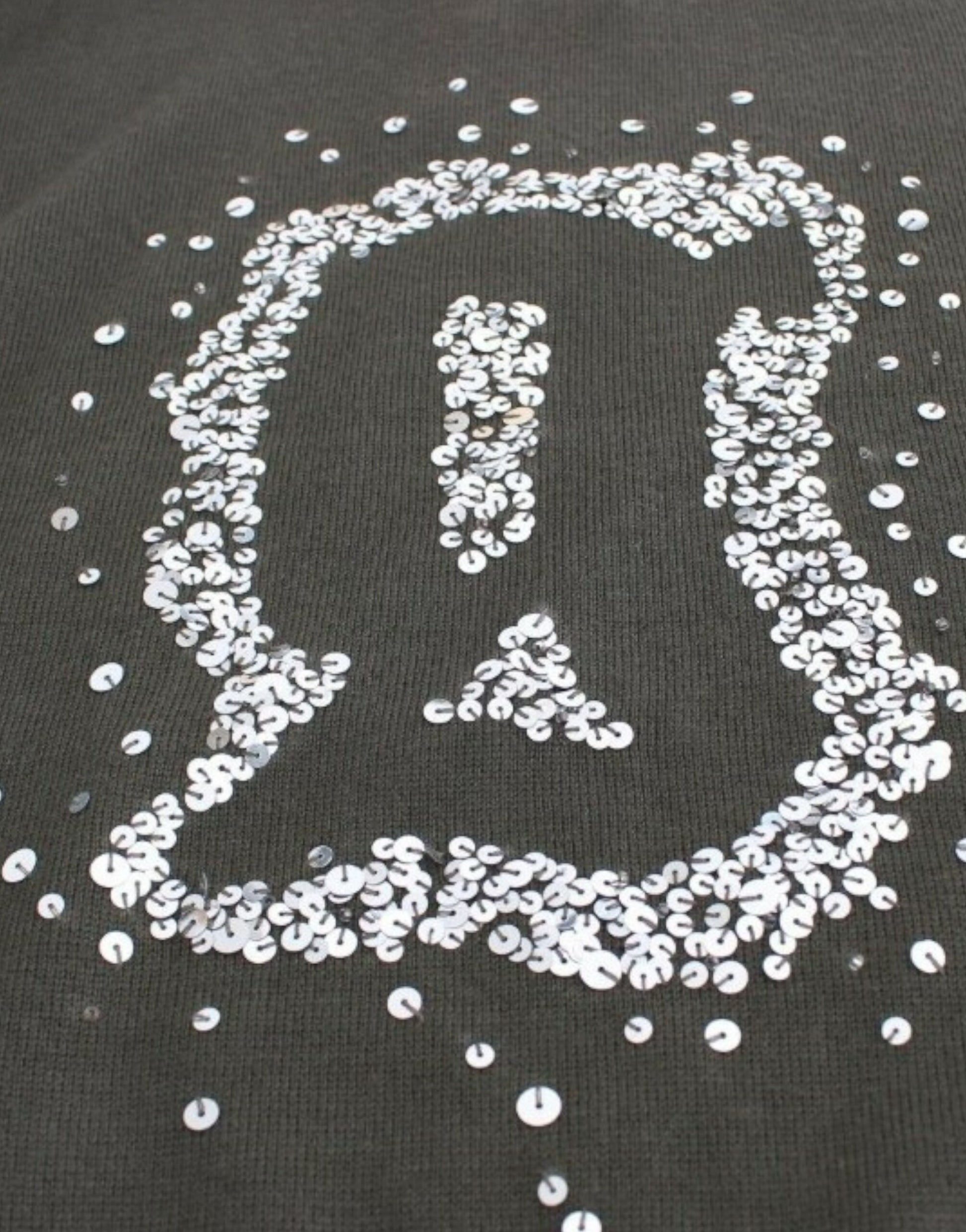 Green wool turtleneck sweater